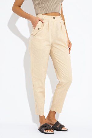Летние бежевые брюки-бананы из льняной ткани...