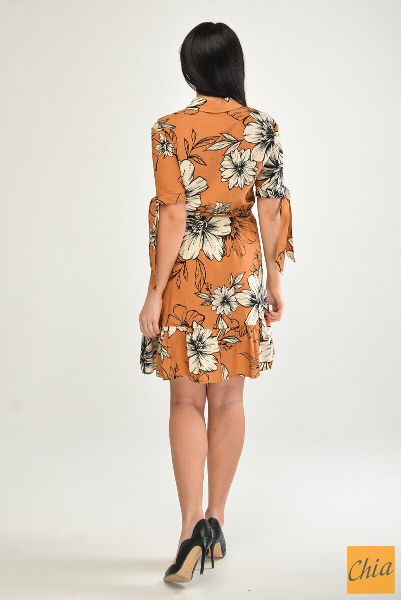 Бежевое льняное расклешенное платье с оборкой в крупный цветочный принт с завязками на рукавах