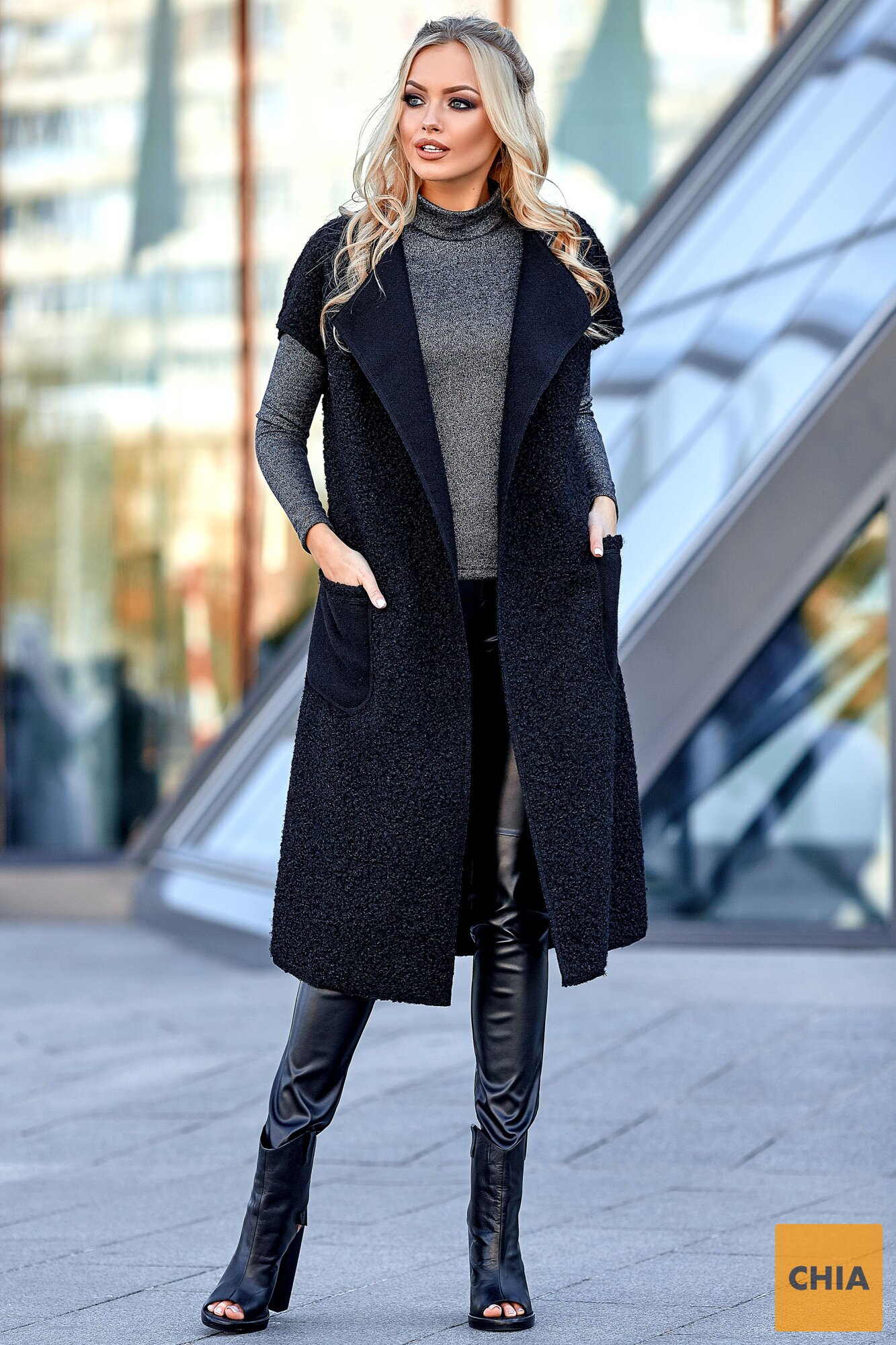 Двусторонний меховой жилет