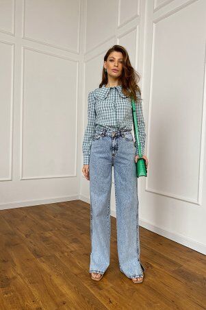 Джинсы widе leg голубого цвета с небольшими р...